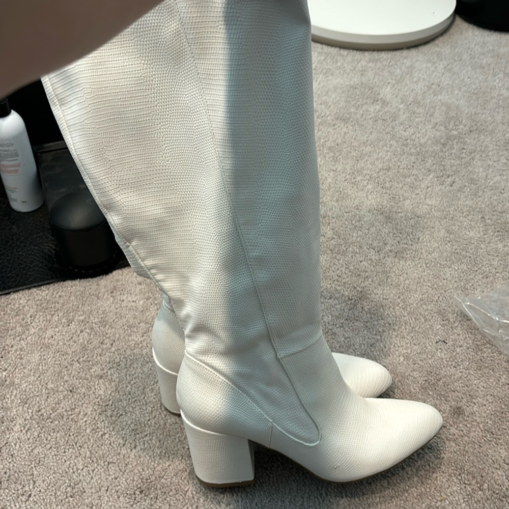 White knee high boots